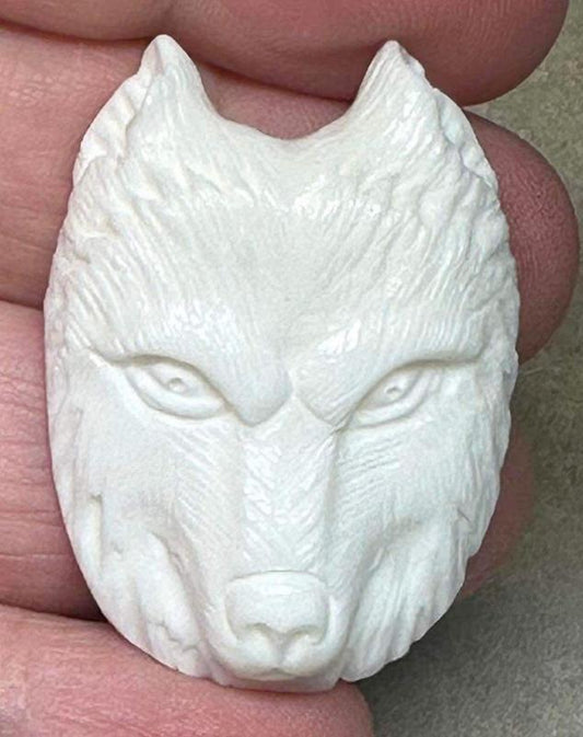 Carved Bone Wolf Face