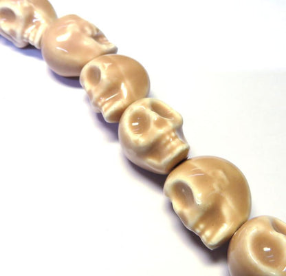 10x 15mm Ceramic Skull Bead String