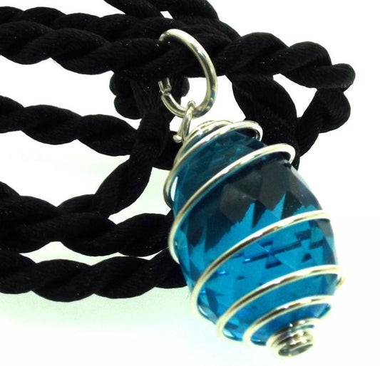 Small Faceted Egg Pacific Andara Crystal Spiral Pendant